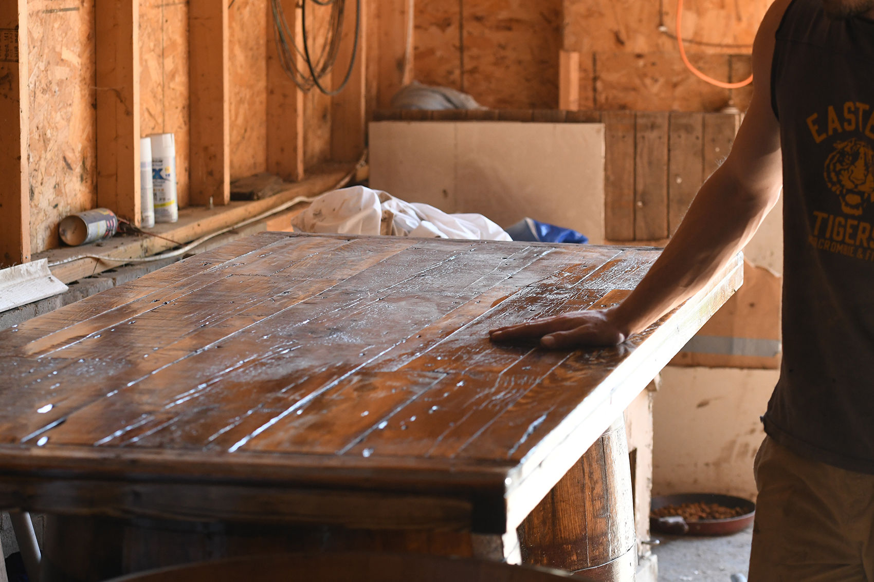 Benji Moser wiping tabletop